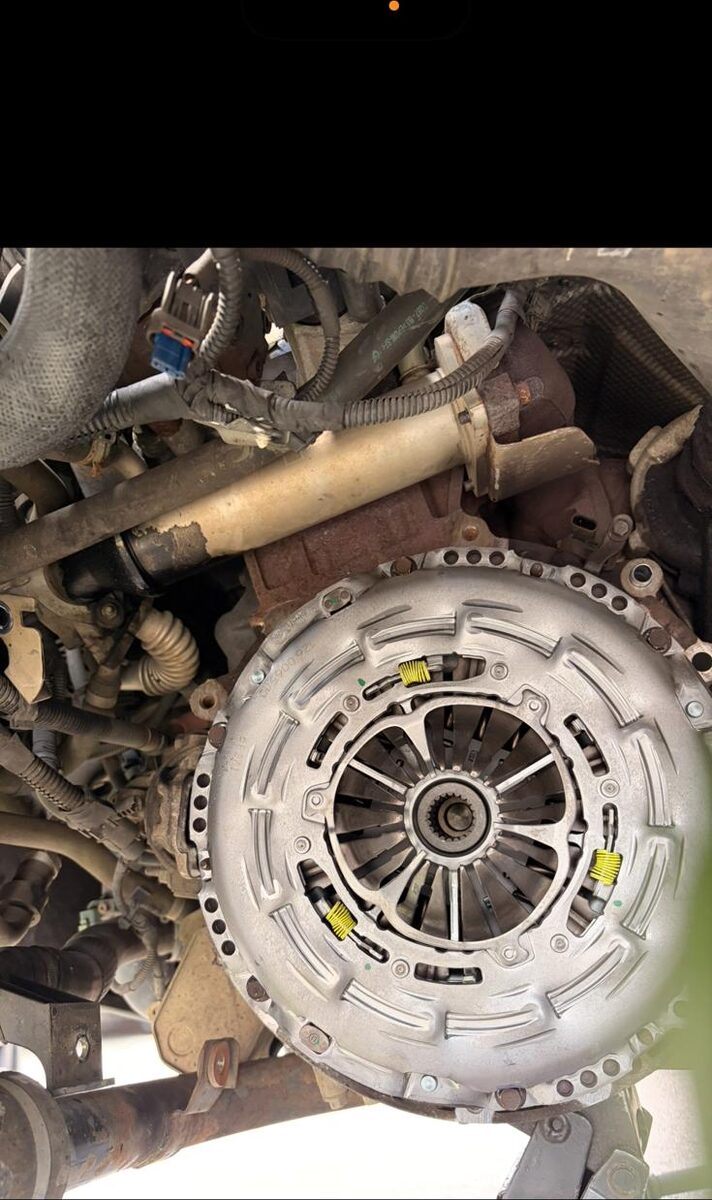 New clutch pressure plate fitted to a gearbox in the vehicle