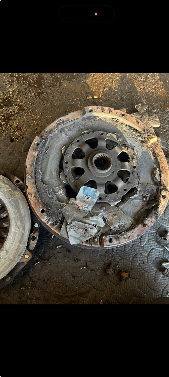 Badly worn dual-mass flywheel removed from a vehicle
