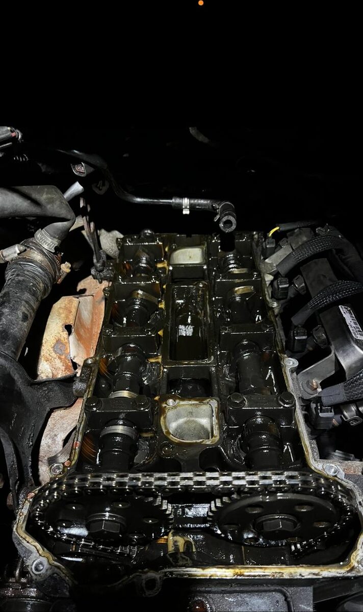 Cylinder head with cam cover removed showing timing chain