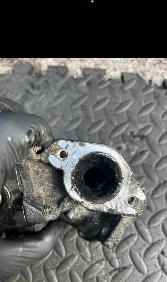 EGR pipe removed showing soot blocking the port