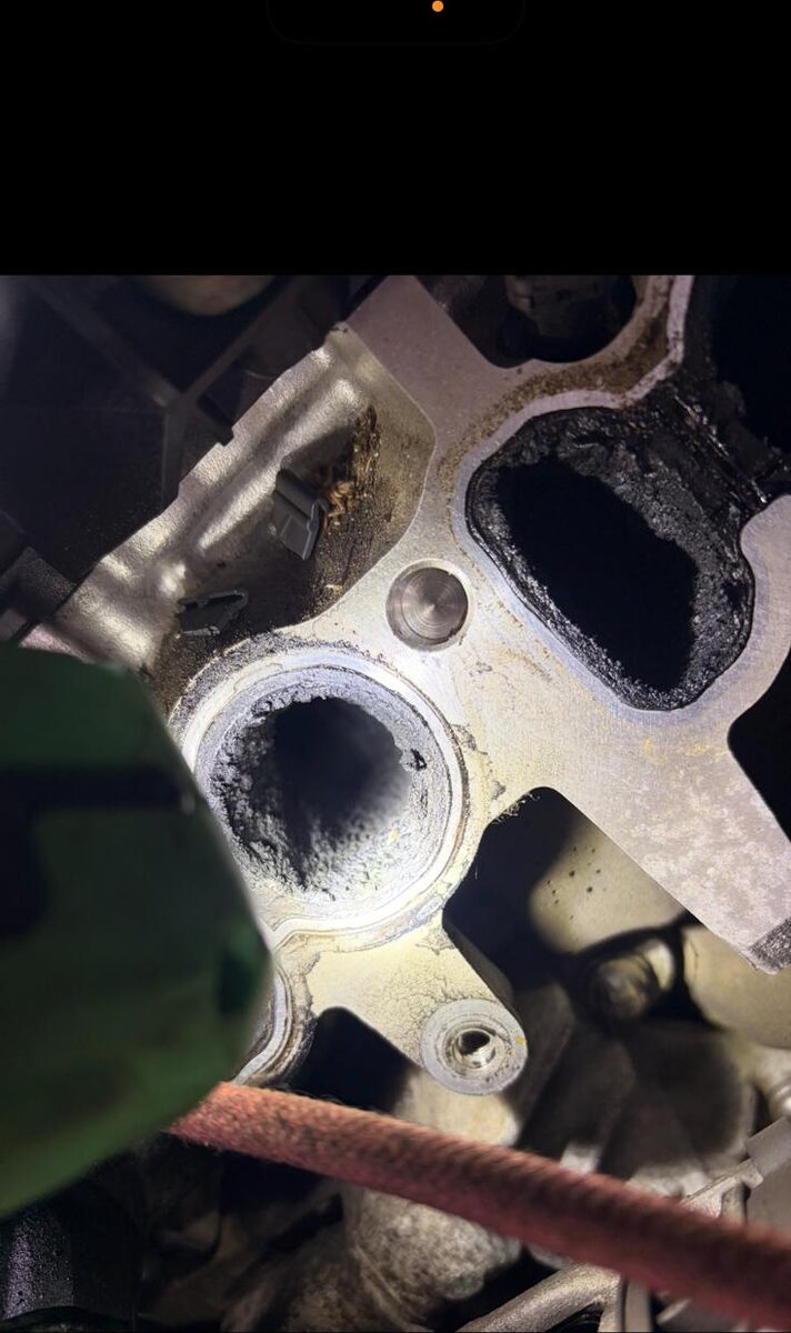 Inlet port in a cylinder head heavily coated in carbon