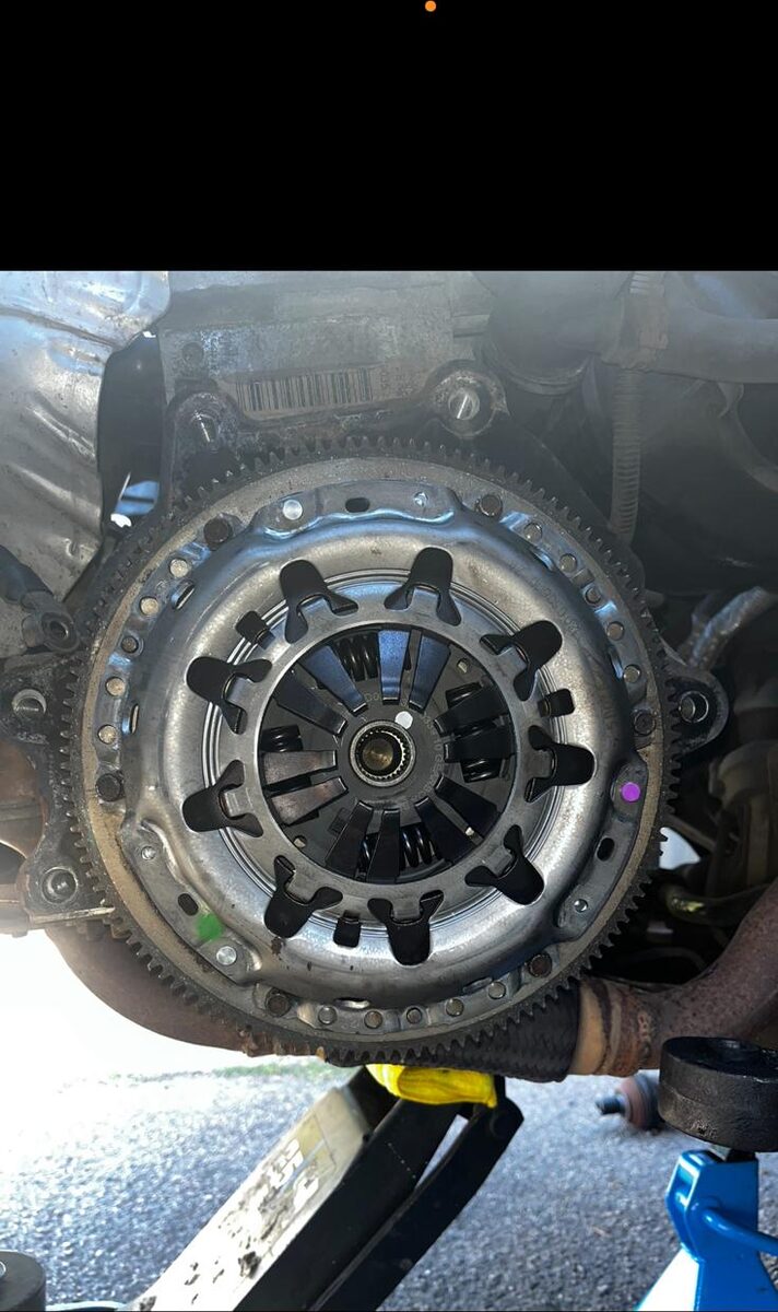 Clutch and flywheel exposed with the gearbox removed